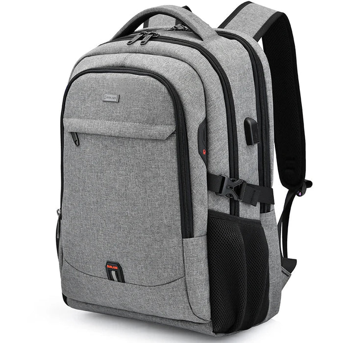 Black Executive Backpack TL084 with USB port, waterproof design, and fits up to 17-inch laptops – ideal for business or travel.