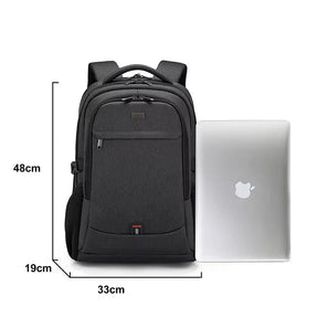 Black Executive Backpack TL084 with USB port, waterproof design, and fits up to 17-inch laptops – ideal for business or travel.