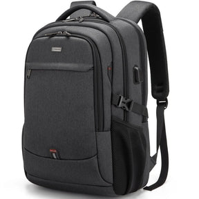 Black Executive Backpack TL084 with USB port, waterproof design, and fits up to 17-inch laptops – ideal for business or travel.